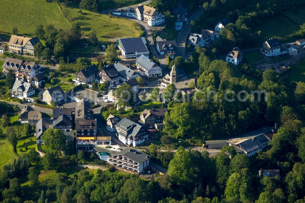 Aerial photograph Schmallenberg OT Nordenau - View of the church Sankt Hubertus in the district of Nordenau in Schmallenberg in the state North Rhine-Westphalia