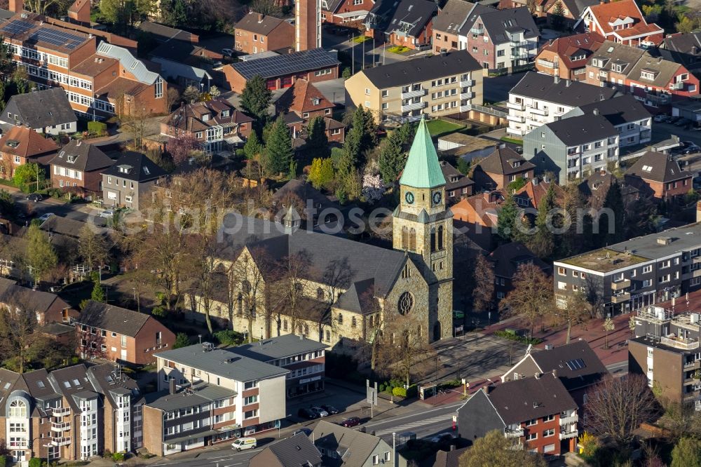 Bottrop from the bird's eye view: View of the church Sankt Johannes der Täufer in the district of Kirchhellen in Bottrop in the state of North Rhine-Westphalia