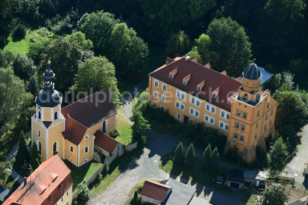 Kühnitzsch from above - Church and castle in the village of Kuehnitzsch in the state of Saxony. The church is located next to the castle