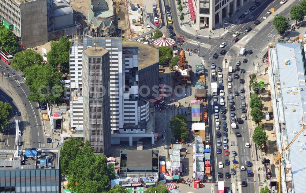 Berlin from above - The Protestant Kaiser William Memorial Church, commonly short memorial church stands on the Breitscheidplatz between the Kurfürstendamm, the Tauentzienstraße and the Budapest street in Berlin's Charlottenburg district. The non-damaged part of the old church is now a museum and war memorial