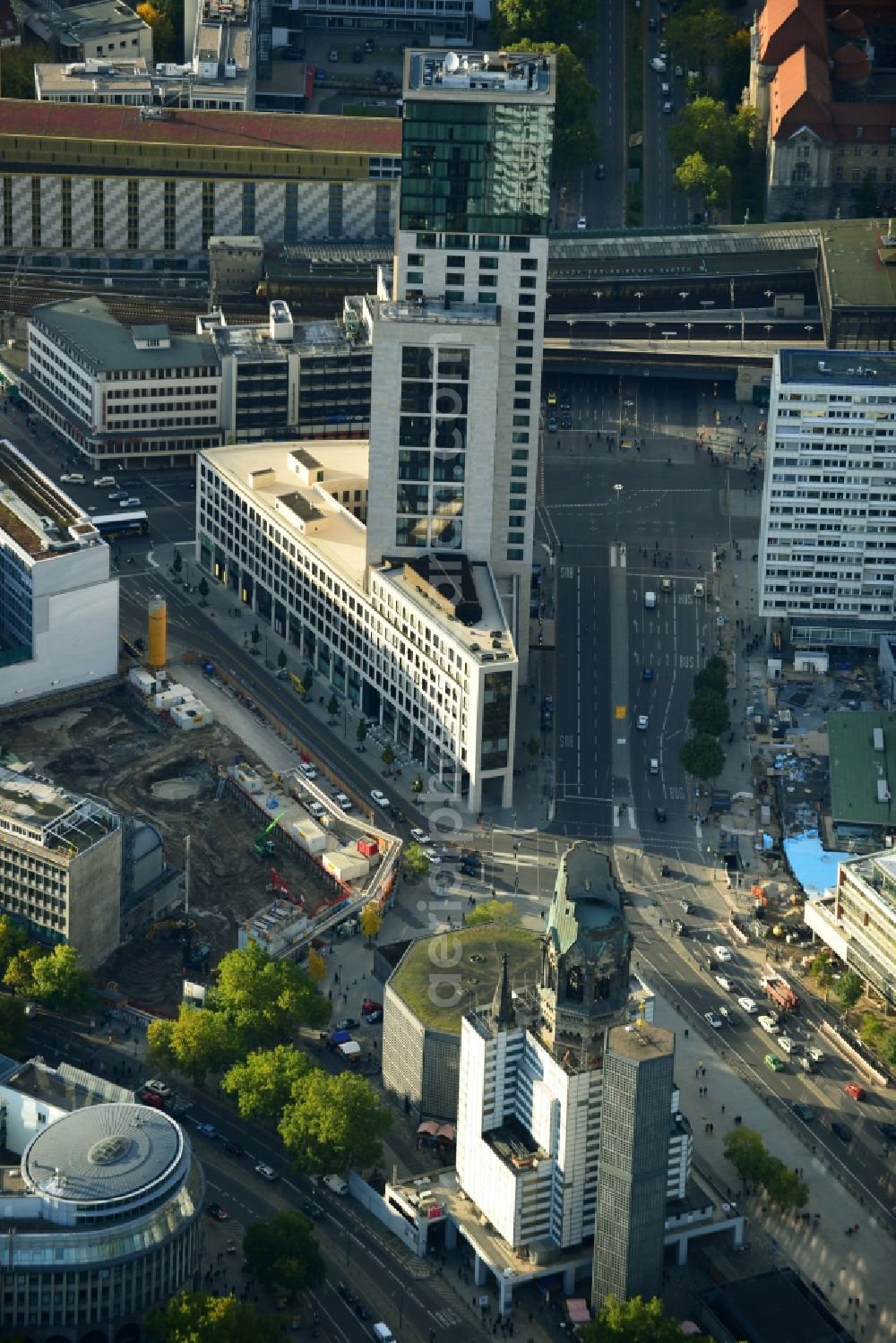 Berlin from the bird's eye view: The Protestant Kaiser William Memorial Church, commonly short memorial church stands on the Breitscheidplatz between the Kurfürstendamm, the Tauentzienstraße and the Budapest street in Berlin's Charlottenburg district. The non-damaged part of the old church is now a museum and war memorial