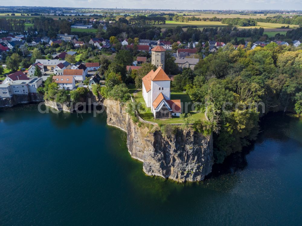 Brandis from above - Church building Bergkirche Beucha on a rocky outcrop of the lake shore on the street Kirchberg in the district of Beucha in Brandis in the federal state of Saxony, Germany