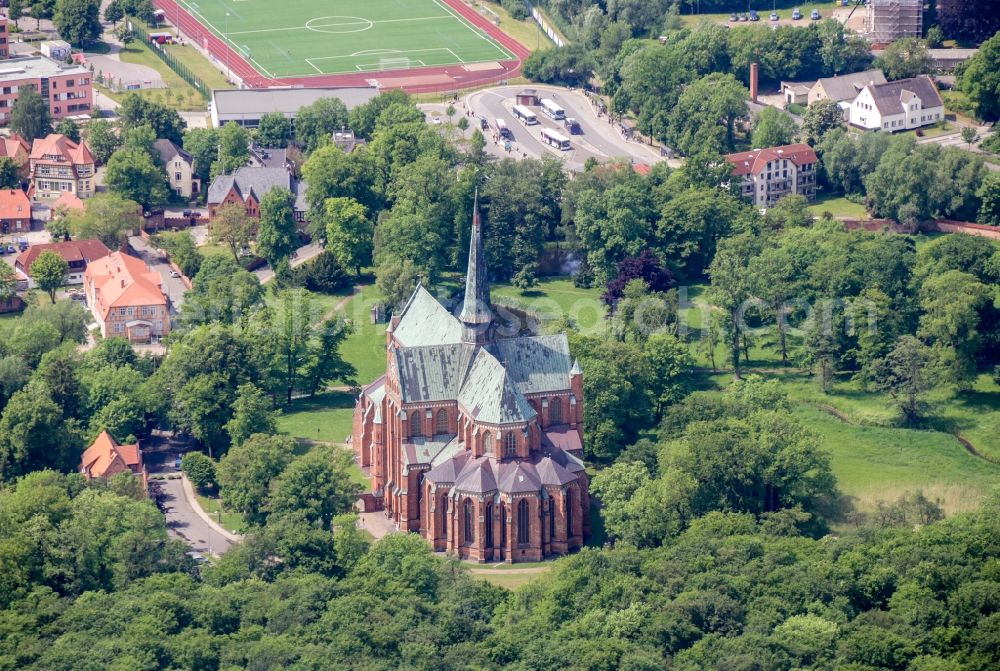 Aerial image Bad Doberan - Church building of the Doberan Muenster in Bad Doberan in the state of Mecklenburg-Vorpommern, Germany. The Doberan Muenster was the monastery church of the Cistercian monastery of Doberan until the middle of the 16th century. It is now the Church of the Evangelical Lutheran Parish of Bad Doberan in the provost of Rostock in the Church district Mecklenburg of the Evangelical Lutheran Church in northern Germany. Muenster is one of the most important high-gothic brick buildings in the Baltic Sea region