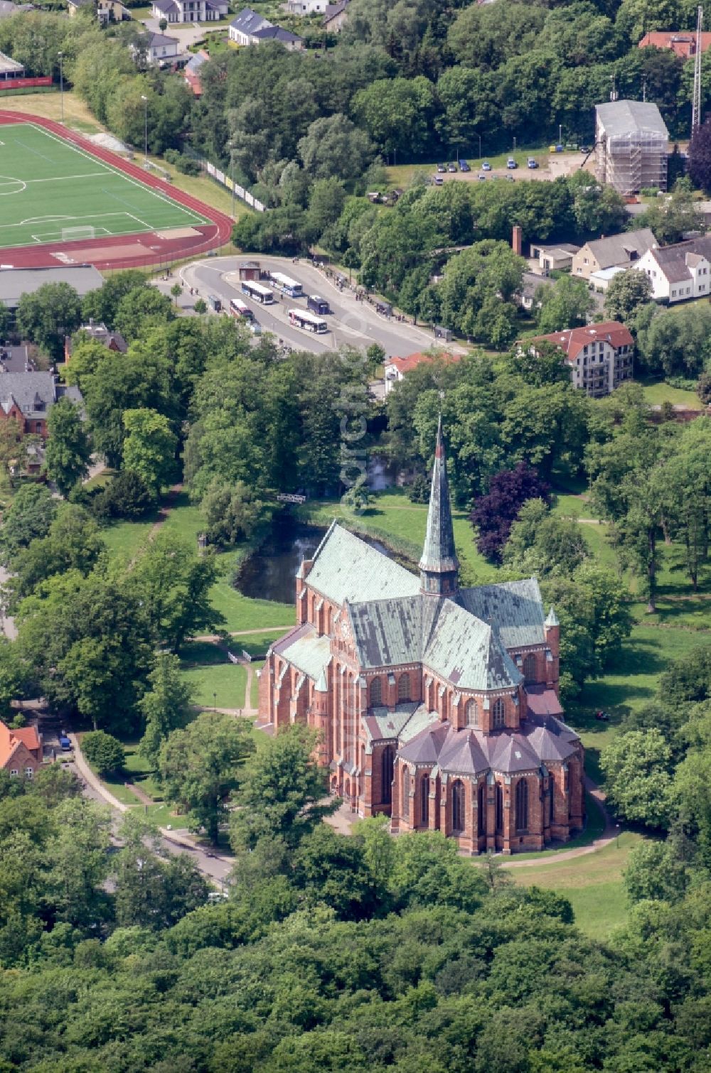 Aerial photograph Bad Doberan - Church building of the Doberan Muenster in Bad Doberan in the state of Mecklenburg-Vorpommern, Germany. The Doberan Muenster was the monastery church of the Cistercian monastery of Doberan until the middle of the 16th century. It is now the Church of the Evangelical Lutheran Parish of Bad Doberan in the provost of Rostock in the Church district Mecklenburg of the Evangelical Lutheran Church in northern Germany. Muenster is one of the most important high-gothic brick buildings in the Baltic Sea region