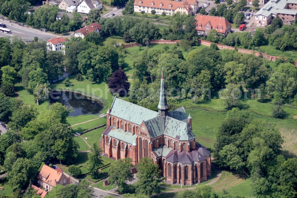 Bad Doberan from the bird's eye view: Church building of the Doberan Muenster in Bad Doberan in the state of Mecklenburg-Vorpommern, Germany. The Doberan Muenster was the monastery church of the Cistercian monastery of Doberan until the middle of the 16th century. It is now the Church of the Evangelical Lutheran Parish of Bad Doberan in the provost of Rostock in the Church district Mecklenburg of the Evangelical Lutheran Church in northern Germany. Muenster is one of the most important high-gothic brick buildings in the Baltic Sea region