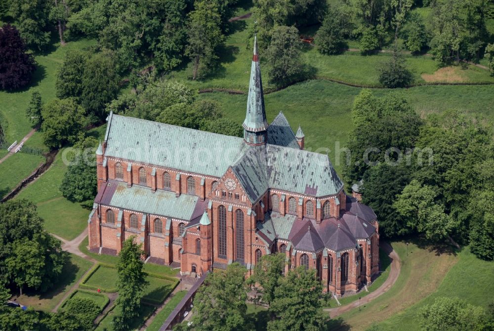 Aerial image Bad Doberan - Church building of the Doberan Muenster in Bad Doberan in the state of Mecklenburg-Vorpommern, Germany. The Doberan Muenster was the monastery church of the Cistercian monastery of Doberan until the middle of the 16th century. It is now the Church of the Evangelical Lutheran Parish of Bad Doberan in the provost of Rostock in the Church district Mecklenburg of the Evangelical Lutheran Church in northern Germany. Muenster is one of the most important high-gothic brick buildings in the Baltic Sea region