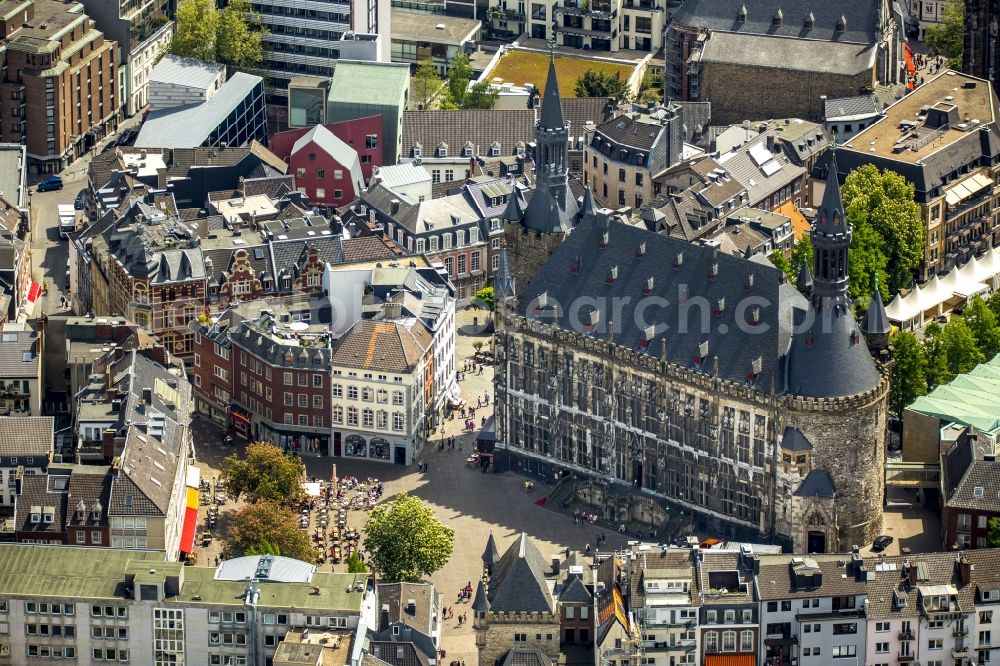 Aerial photograph Aachen - Church building of the cathedral at Aachen in North Rhine-Westphalia. Called the Aachen Cathedral, also Imperial Cathedral or Aachener Muenster, on Cathedral Square of the Old Town- center in Aachen is the episcopal church of the diocese of Aachen. The cathedral was added to the UNESCO list of world cultural heritage