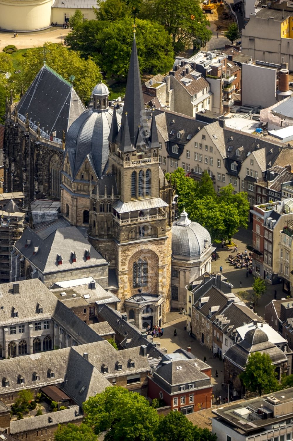 Aerial photograph Aachen - Church building of the cathedral at Aachen in North Rhine-Westphalia. Called the Aachen Cathedral, also Imperial Cathedral or Aachener Muenster, on Cathedral Square of the Old Town- center in Aachen is the episcopal church of the diocese of Aachen. The cathedral was added to the UNESCO list of world cultural heritage