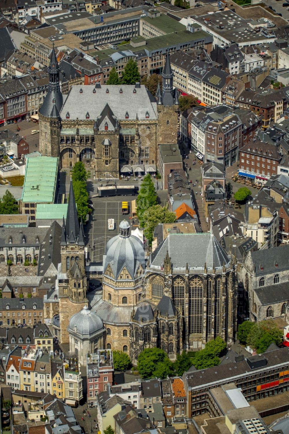 Aerial image Aachen - Church building of the cathedral at Aachen in North Rhine-Westphalia. Called the Aachen Cathedral, also Imperial Cathedral or Aachener Muenster, on Cathedral Square of the Old Town- center in Aachen is the episcopal church of the diocese of Aachen. The cathedral was added to the UNESCO list of world cultural heritage