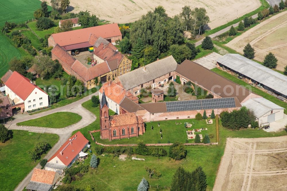 Niederer Fläming from above - Church building in the village of in the district Hoefgen in Niederer Flaeming in the state Brandenburg, Germany