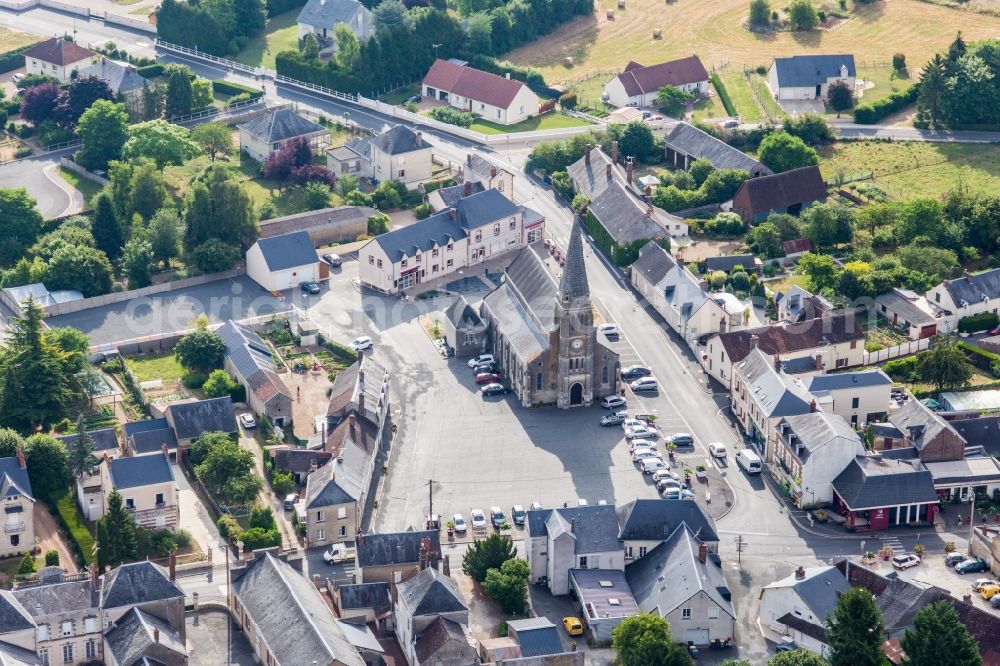 Aerial image Saint-Amand-Longpre - Church building in the village of in Saint-Amand-Longpre in Centre-Val de Loire, France