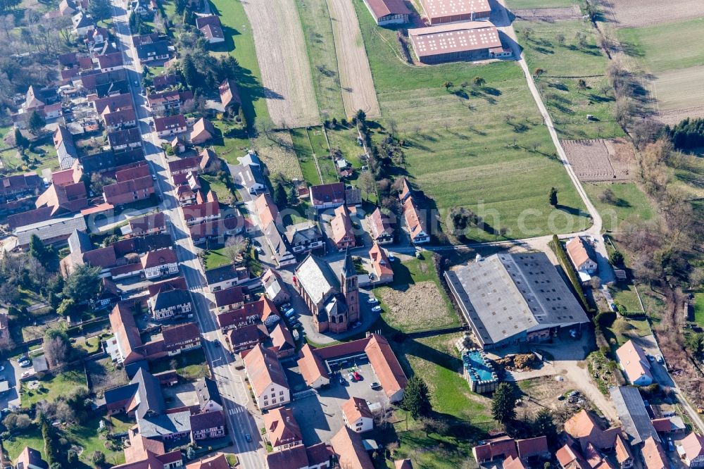 Aerial image Betschdorf - Church building of Saint Jean in the village of in Betschdorf in Grand Est, France