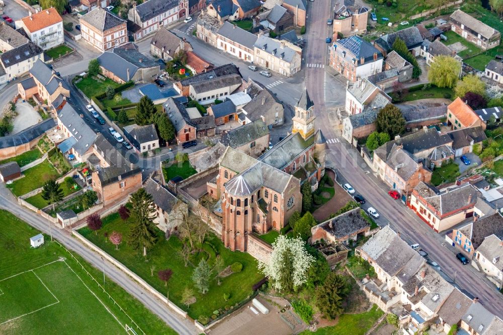 Aerial image Origny-en-Thierache - Church building Eglise Saints Cyr et Juliette in Origny-en-Thierache in Hauts-de-France, France