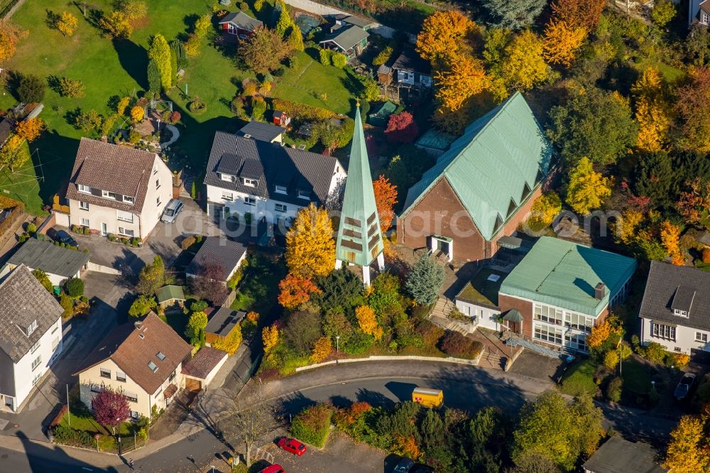 Aerial image Arnsberg - Church building of the protestant redeemer church on a autumnal forest in Arnsberg in the state of North Rhine-Westphalia