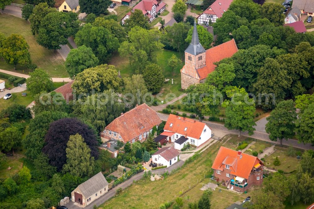 Aerial image Vipperow - Church building of gray stone church with the old town hall on the village road in Vipperow in Mecklenburg-Vorpommern