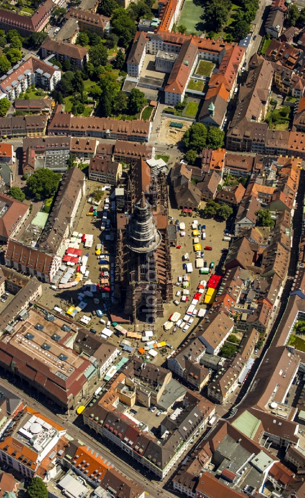 Aerial image Freiburg im Breisgau - Church building of the Freiburg Muenster Cathedral Square in the old town of Freiburg in Baden-Wuerttemberg. freiburgermuenster.info