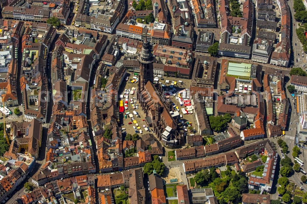 Freiburg im Breisgau from the bird's eye view: Church building of the Freiburg Muenster Cathedral Square in the old town of Freiburg in Baden-Wuerttemberg. freiburgermuenster.info