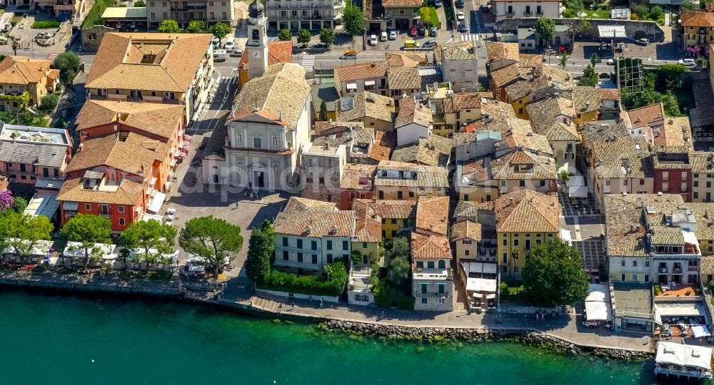 Torri del Benaco from above - Church building holy Peter and Paul in Torri del Benaco at the Garda sea in Veneto, Italy