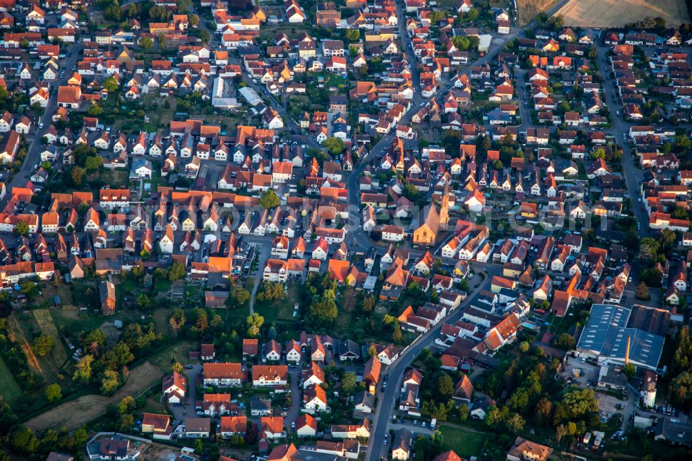 Harthausen from above - Church building Kath. Kirche St. Johannes of Taeufe in the village of on street Speyerer Strasse in Harthausen in the state Rhineland-Palatinate, Germany