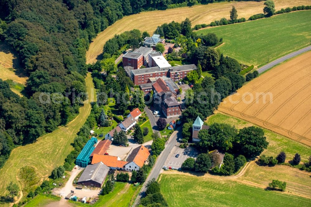 Aerial image Hattingen - Church building Kath. Rectory Pastor Bush St. Maria Conception in Hattingen in North Rhine-Westphalia. In the foreground the elderly nursing home of Theresa Albers gGmbH