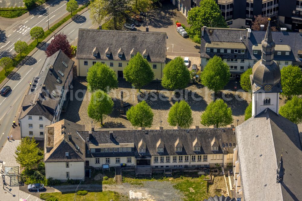 Meschede from above - Church building Kath. Pfarrkirche St. Walburga on Stiftsplatz in Meschede at Sauerland in the state North Rhine-Westphalia, Germany