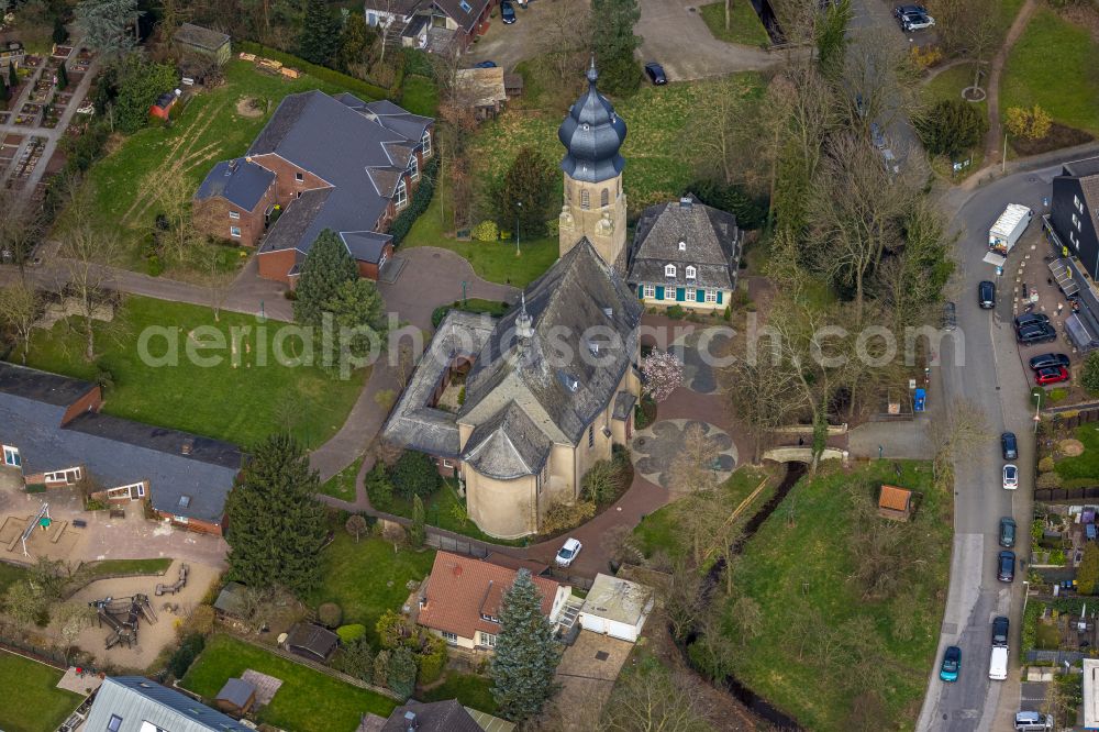 Duisburg from above - Church building Katholische Pfarrkirche St.Hubertus on street Am Rahmer Bach in the district Rahm in Duisburg at Ruhrgebiet in the state North Rhine-Westphalia, Germany