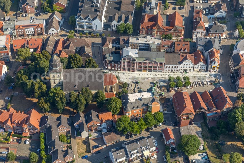 Ahlen from above - Church building of the Catholic parish of St. Bartholomew in the old city center of the city center in Ahlen in the federal state of North Rhine-Westphalia, Germany