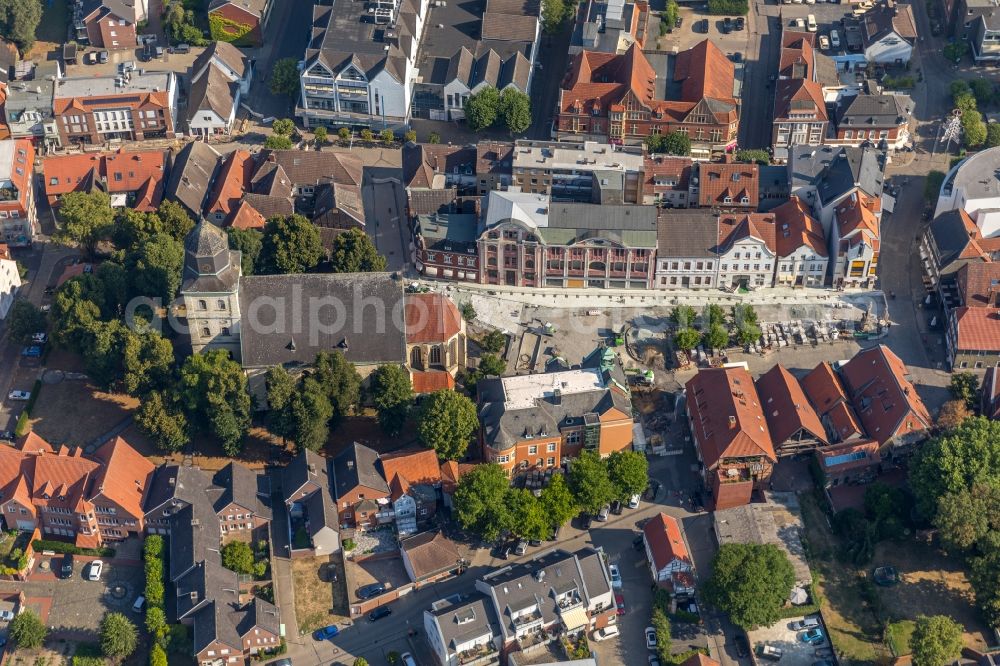 Ahlen from the bird's eye view: Church building of the Catholic parish of St. Bartholomew in the old city center of the city center in Ahlen in the federal state of North Rhine-Westphalia, Germany