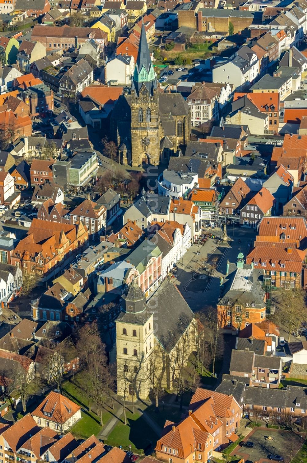 Ahlen from the bird's eye view: Church building of the Catholic parish of St. Bartholomew in the old city center of the city center in Ahlen in the federal state of North Rhine-Westphalia, Germany