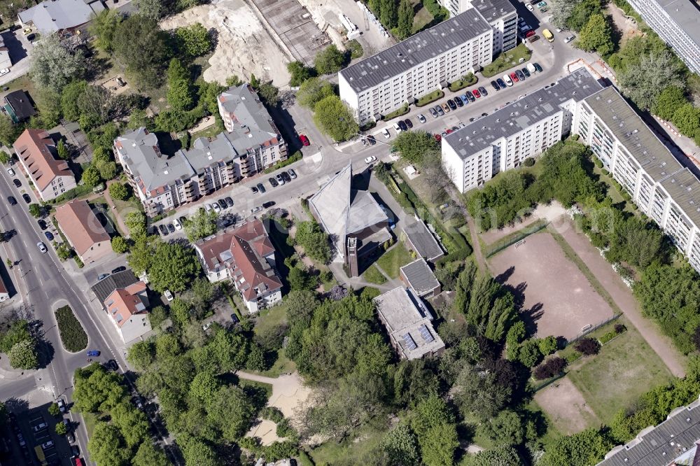 Aerial image Berlin - Church building of the catholic community Zum Guten Hirten in a residential area on Kurze Strasse in the Friedrichsfelde part of the district of Lichtenberg in Berlin, Germany