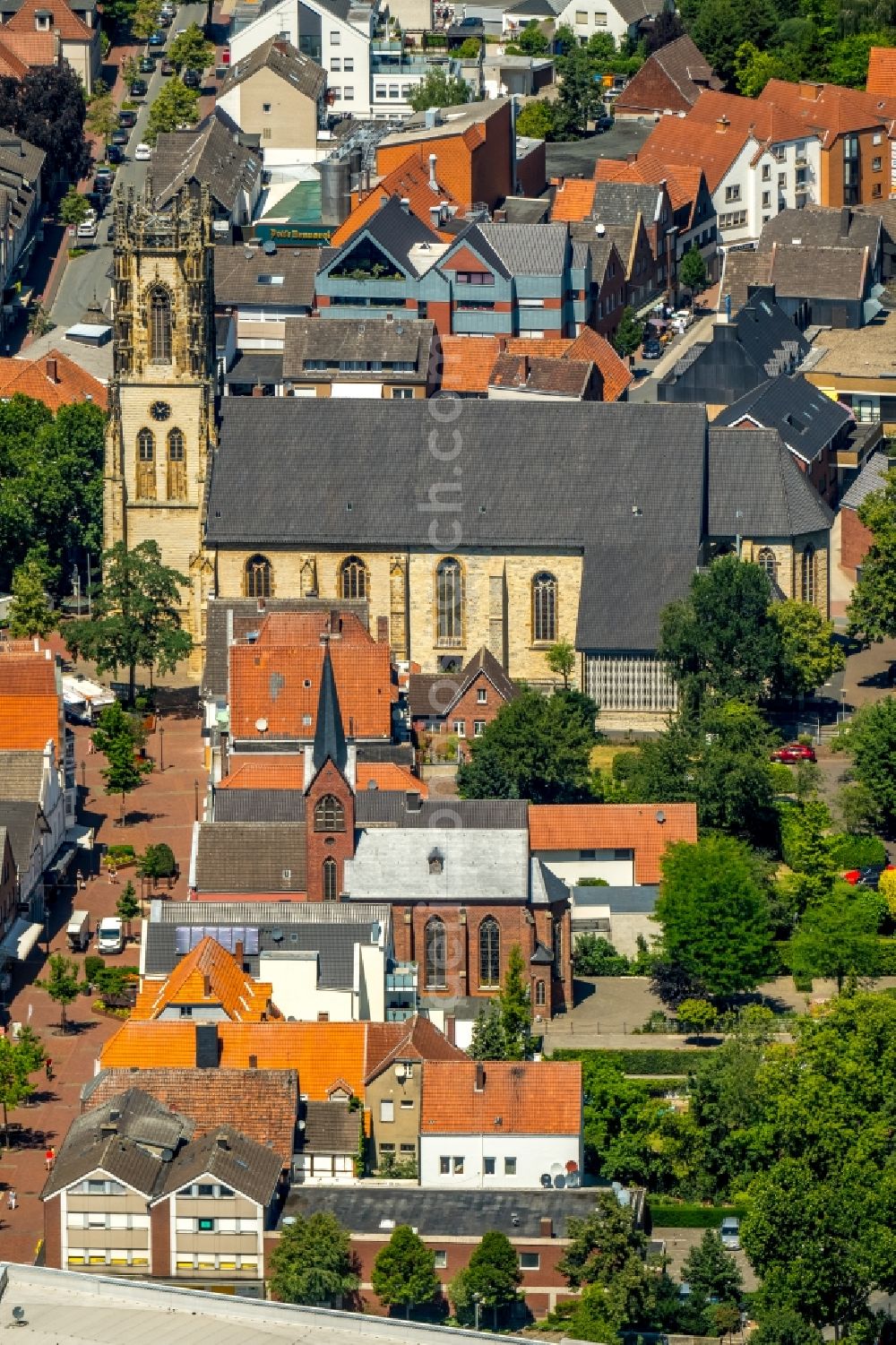 Oelde from above - Church building of the Catholic St. John's Church in the old town centre of the city centre in Oelde in the federal state of North Rhine-Westphalia, Germany