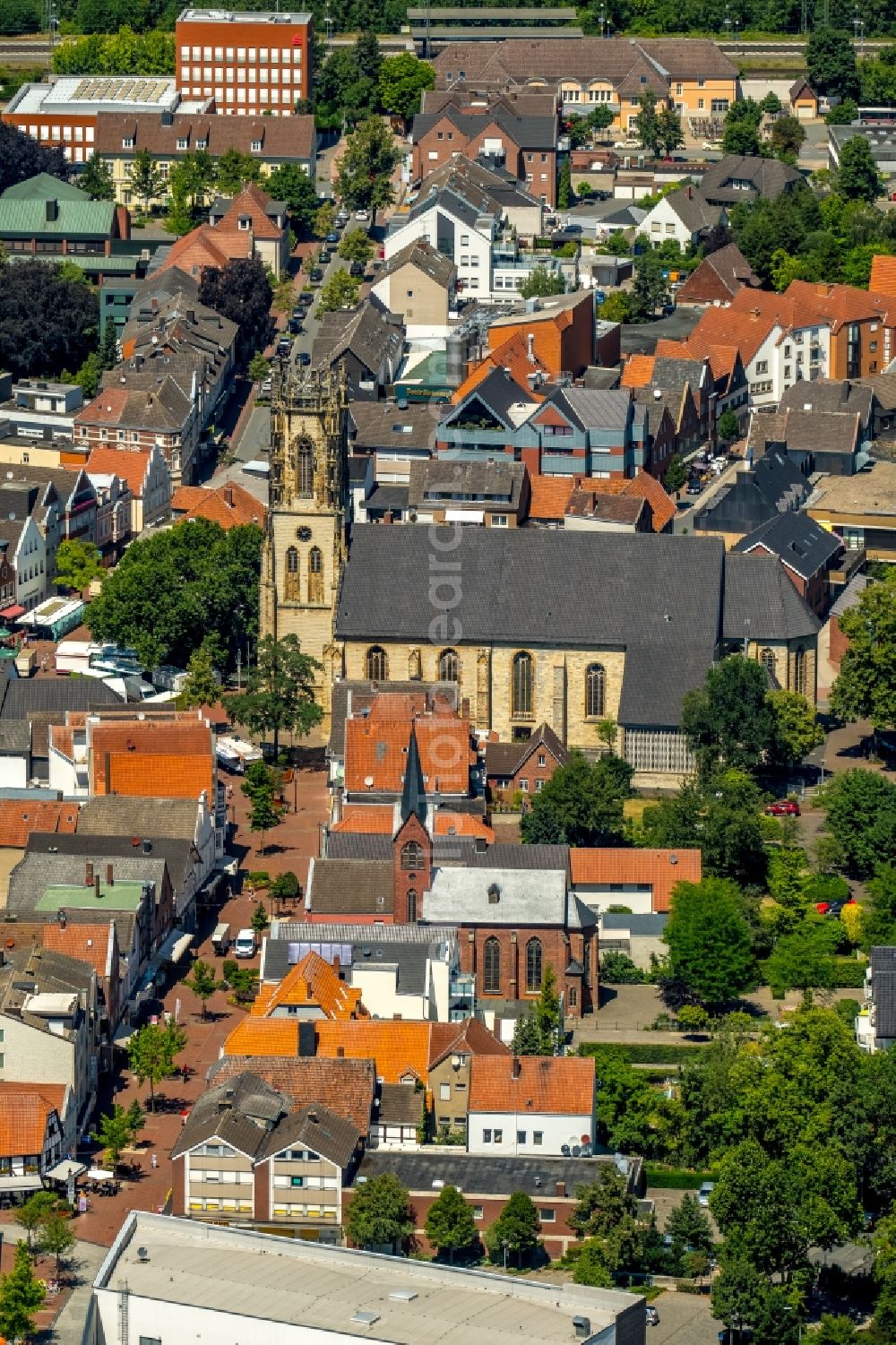 Oelde from the bird's eye view: Church building of the Catholic St. John's Church in the old town centre of the city centre in Oelde in the federal state of North Rhine-Westphalia, Germany