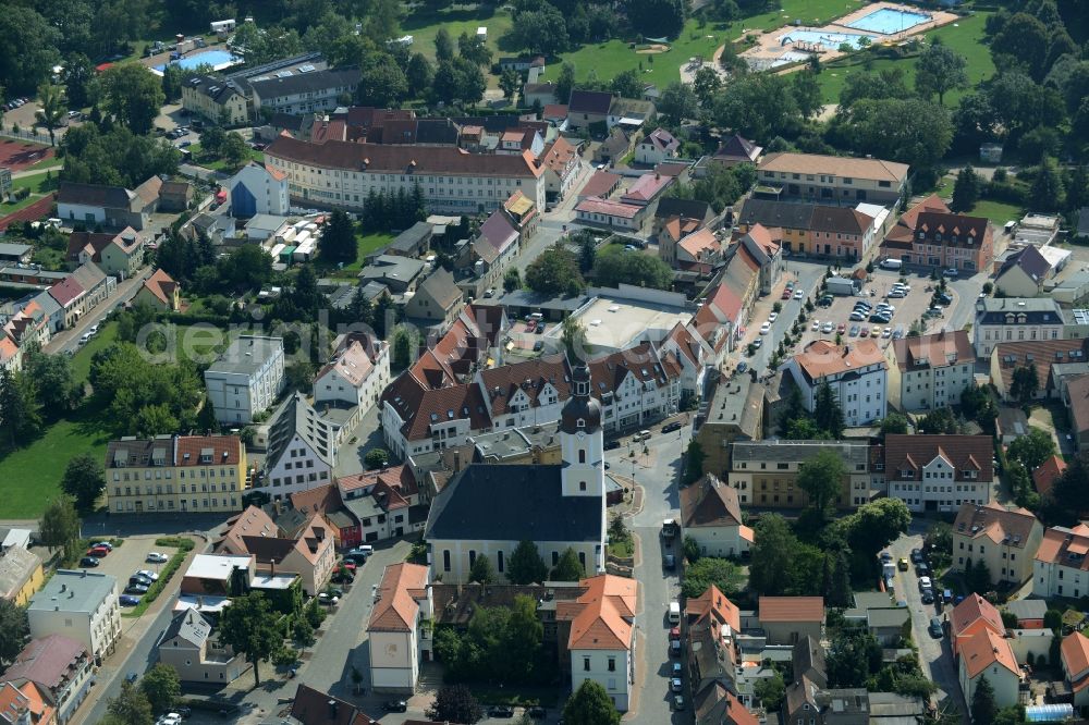 Taucha from above - Church building St. Moritz in the historic town- center of Taucha in the state of Saxony. The church with the white front is located on church square in the centre of the town