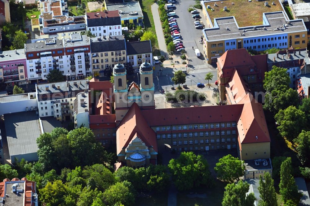 Berlin from above - Church building Kirche zum Vaterhaus on Baumschulenstrasse in the district Baumschulenweg in Berlin, Germany