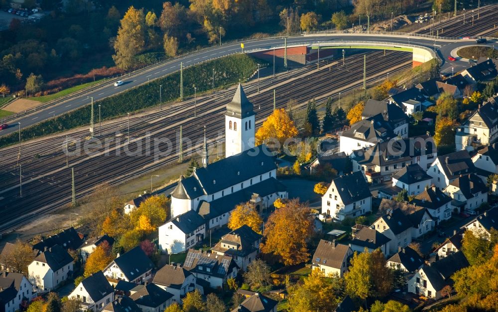 Aerial image Finnentrop - Church building of the community of Saint John Nepomuk on railway tracks in Finnentrop in the state of North Rhine-Westphalia