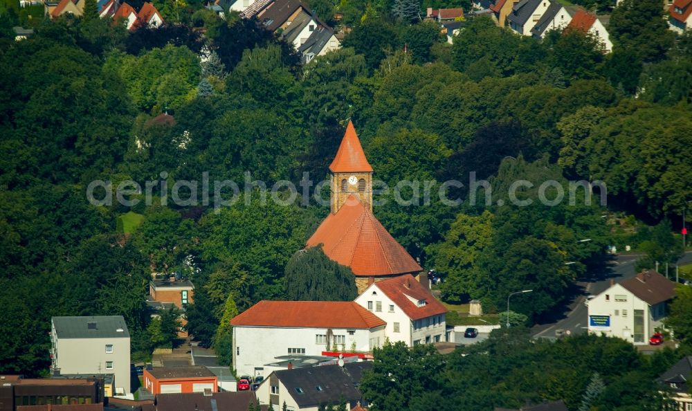 Kirchlengern from above - Church building of the community of Auf der Wehme in Kirchlengern in the state of North Rhine-Westphalia. The church with its tower and red roof is located on Luebbecker Strasse