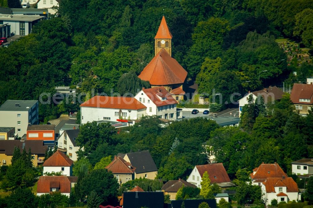 Aerial image Kirchlengern - Church building of the community of Auf der Wehme in Kirchlengern in the state of North Rhine-Westphalia. The church with its tower and red roof is located on Luebbecker Strasse