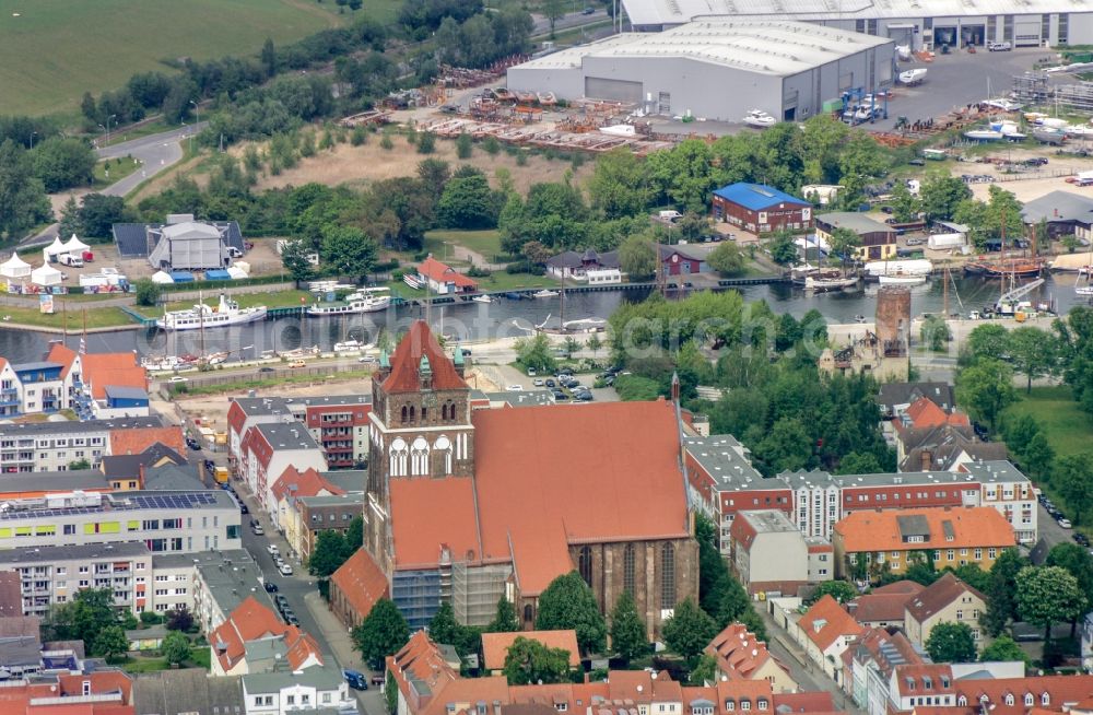 Greifswald from the bird's eye view: Church building of the St. Mary's Church in Greifswald in the federal state of Mecklenburg-Vorpommern, Germany. The evangelical St. Mary's Church, popularly also known as Fat Marie, is the oldest of the three major city churches of Greifswald, built in the style of the North German brick Gothic