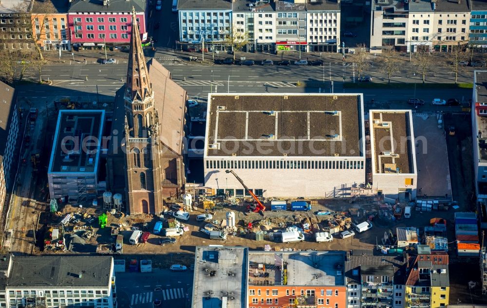 Aerial photograph Bochum - Church building Marienkirche at the Marienplatz with the almost finished construction site of the Bochum Symphony in Bochum in the state North Rhine-Westphalia