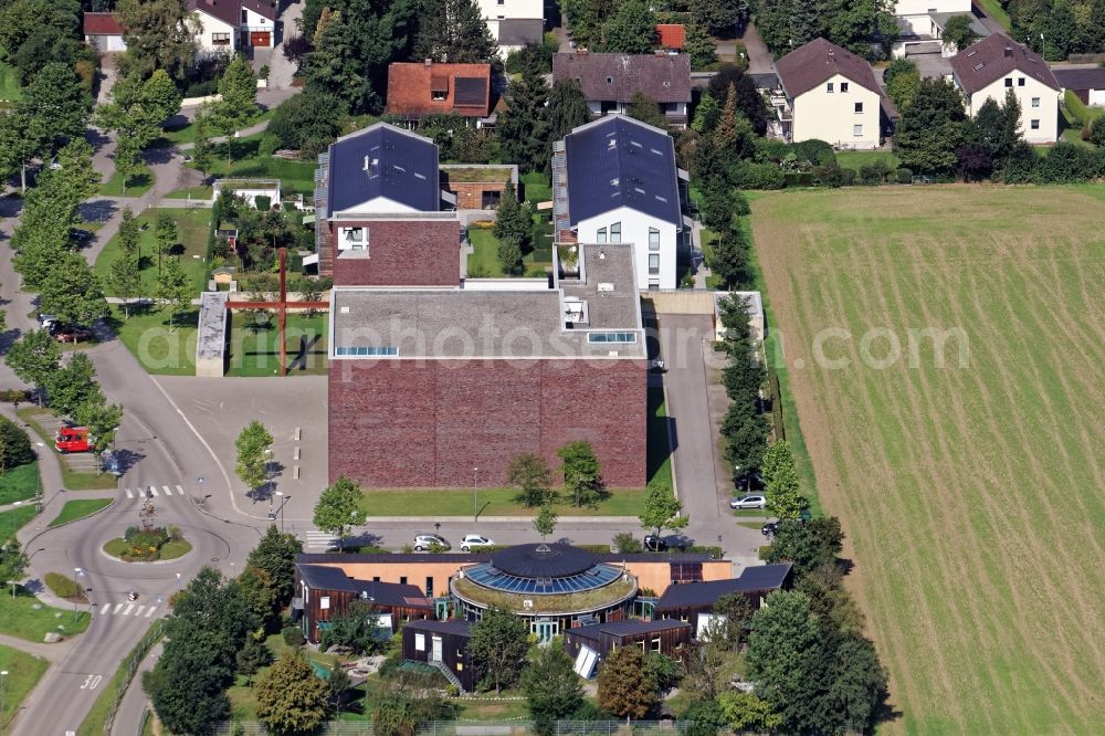 Aerial image Neuried - Church building St. Nikolaus and Kindergarten am Maxhofweg in Neuried in the state Bavaria