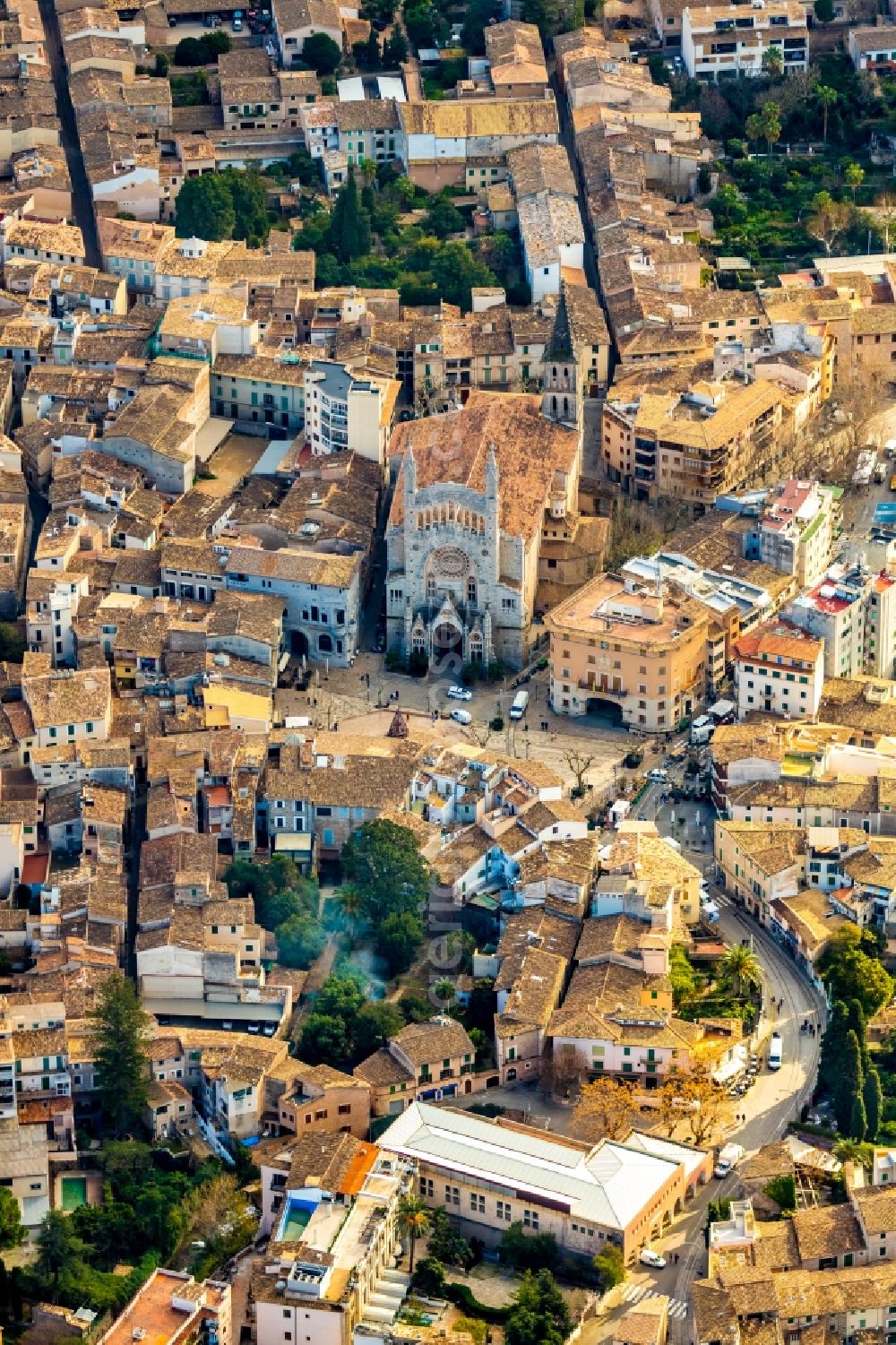 Aerial image Soller - Church building St. Bartholomaeus on Plaza ConstituciA?n in the village of in Soller in Balearic Islands, Spain