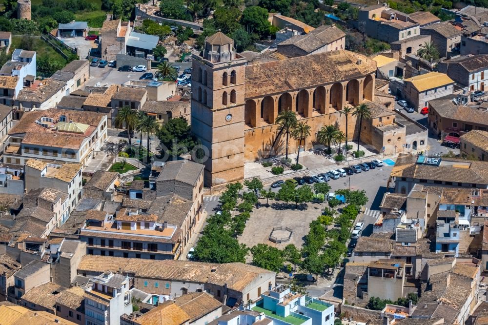 Aerial image Muro - Church building of ParrA?quia Sant Joan Baptista on Carrer Bisbe Ramon de Torrella in Muro in Balearic island of Mallorca, Spain