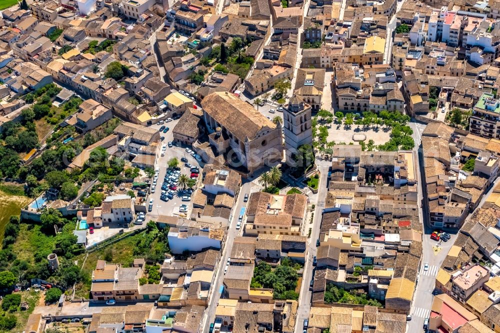 Aerial photograph Muro - Church building of ParrA?quia Sant Joan Baptista on Carrer Bisbe Ramon de Torrella in Muro in Balearic island of Mallorca, Spain