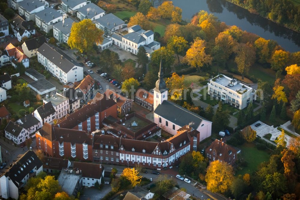 Aerial image Essen - Church building of Saint Peter and home for the elderly of Saint Josef in the autumnal Kettwig part of Essen in the state of North Rhine-Westphalia