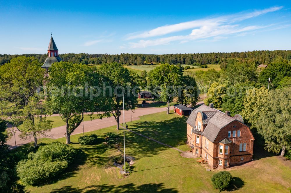 Aerial image Saltvik - Church building Saltviks kyrka on street Kvarnboviken in Saltvik in Alands landsbygd, Aland