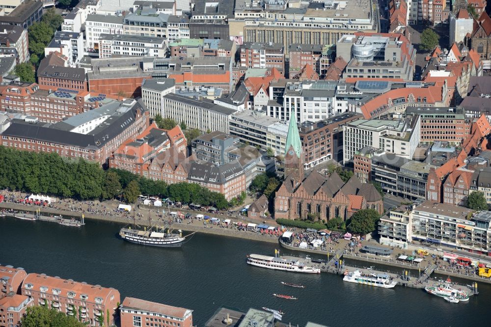 Aerial image Bremen - Church building of Sankt Martini on the riverbank of the Weser in the historic town centre of Bremen in Germany