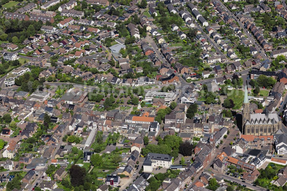 Aerial photograph Willich - Church building St. Johannes on the street Kirchplatz in Willich Anrath in the federal state of North Rhine-Westphalia, Germany