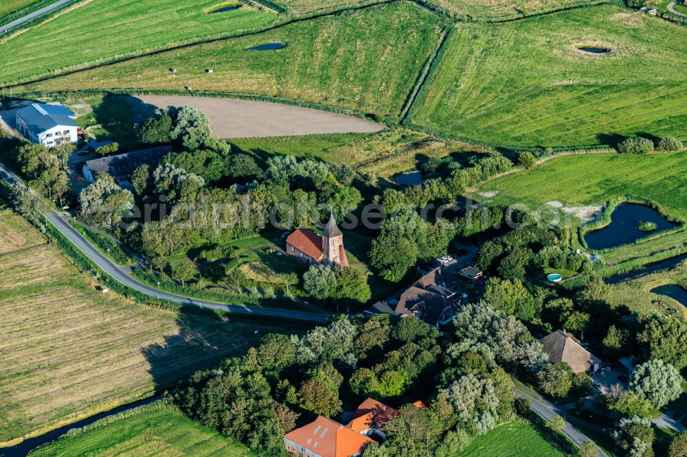 Westerhever from above - Church building St.Stephanus in the village center in Westerhever in the state Schleswig-Holstein, Germany