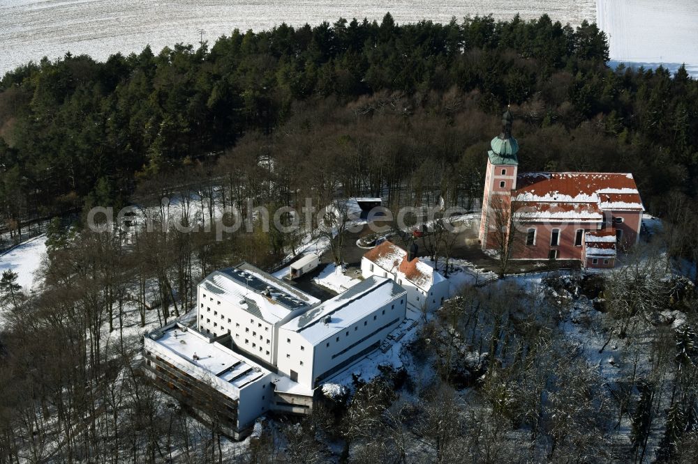 Aerial photograph Velburg - Wintry snowy Church building on Wallfahrt- und Dioezesanjugendhaus Habsberg in Velburg in the state Bavaria