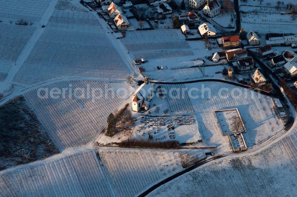 Aerial image Gleiszellen-Gleishorbach - Winterly snowed building and grave yard of the chapel Dyonisus in Gleiszellen-Gleishorbach in the state Rhineland-Palatinate